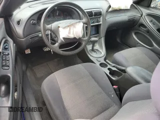 2004 Ford Mustang Deluxe with VIN 1FAFP44654F208654, listed as a Copart auction lot 61385425 with 108,916 mi miles and Salvage title. Bid and sale history available at DreamBid. Image 8.