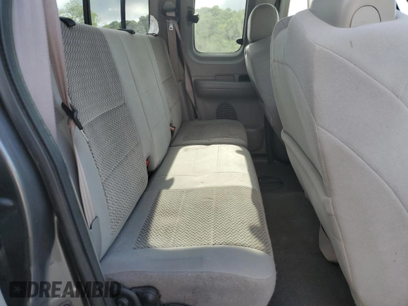 2003 Ford F-150 XL with VIN 2FTRX18L73CA49989, listed as a Copart auction lot 57434025 with 141,876 mi miles and Salvage title. Bid and sale history available at DreamBid. Image 10.