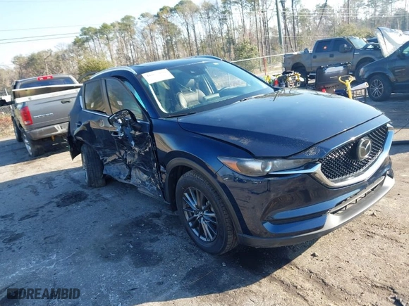 2019 Mazda CX-5 Touring with VIN JM3KFACM5K1608354, listed as a IAAI auction lot 41675828 with NaN miles. Bid and sale history available at carsss.com. Image 1.