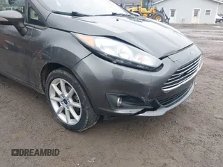 2018 Ford Fiesta SE with VIN 3FADP4EJ9JM126299, listed as a IAAI auction lot 41660973 with 74,730 mi miles. Bid and sale history available at carsss.com. Image 6.