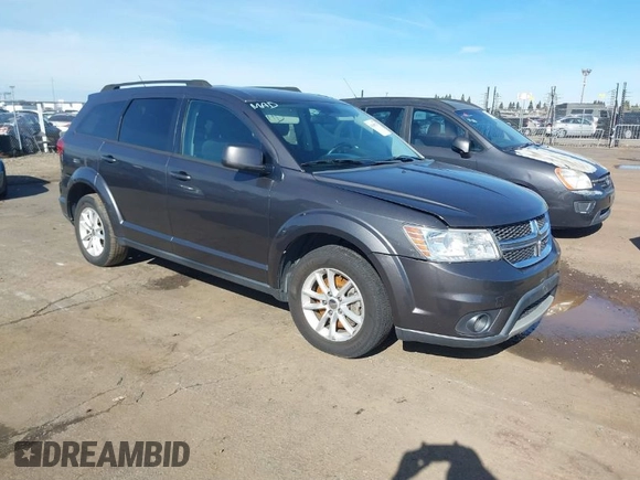 2015 Dodge Journey SXT with VIN 3C4PDCBG9FT696593, listed as a IAAI auction lot 41600713 with 139,763 mi miles. Bid and sale history available at carsss.com. Image 1.