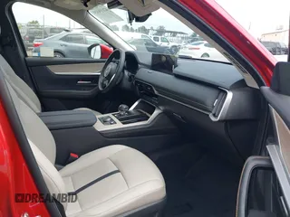 2025 Mazda CX-90 Preferred z VIN JM3KKBHD9S1208744, wystawiony jako IAAI lot #42019049 z przebiegiem 4 663 mil mil oraz . Historia ofert i sprzedaży dostępna na DreamBid. Obrazek 5.