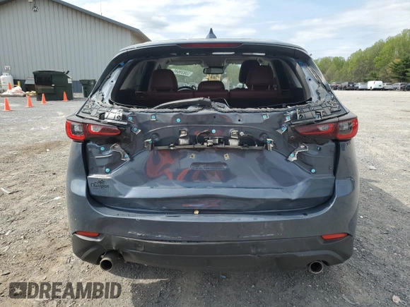 2023 Mazda CX-5 S Carbon Edition z VIN JM3KFBCM9P0158890, wystawiony jako Copart lot #53839045 z przebiegiem 26 623 mil mil oraz Szkody całkowita. Historia ofert i sprzedaży dostępna na DreamBid. Obrazek 6.