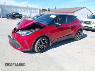 2020 Toyota C-HR LE with VIN JTNKHMBX3L1066720, listed as a IAAI auction lot 42042139 with 98,925 mi miles and . Bid and sale history available at DreamBid. Image 17.