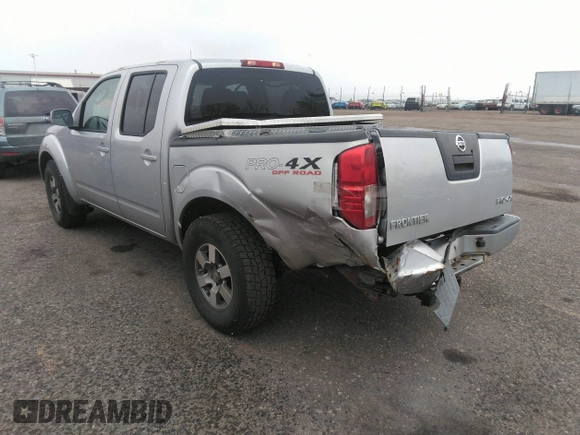 2011 Nissan Frontier Pro-4X with VIN 1N6AD0EV2BC438370, listed as a IAAI auction lot 41952484 with 217,529 mi miles and . Bid and sale history available at DreamBid. Image 3.