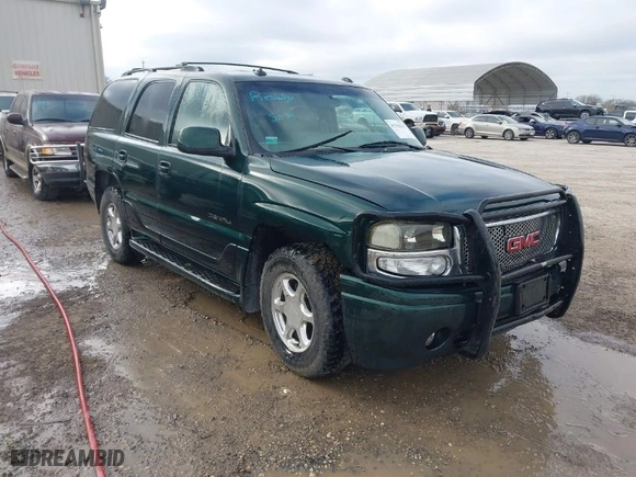 2003 GMC Yukon Denali with VIN 1GKEK63U13J206304, listed as a IAAI auction lot 41703536 with 224,781 mi miles. Bid and sale history available at carsss.com. Image 1.