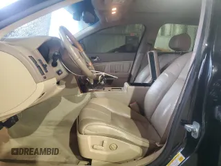 2006 Cadillac STS with VIN 1G6DC67A260208841, listed as a Copart auction lot 43142645 with 165,684 mi miles and Salvage Title. Bid and sale history available at DreamBid. Image 7.