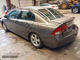 2010 Honda Civic Sdn LX-S with VIN 2HGFA1F69AH537117, listed as a IAAI auction lot 41960907 with 133,981 mi miles. Bid and sale history available at carsss.com. Image 3.