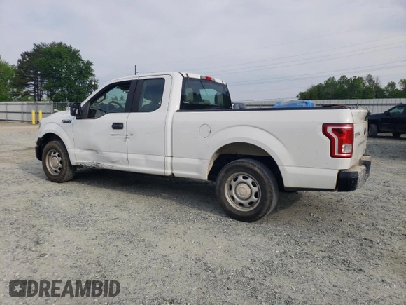 2015 Ford F-150 XL with VIN 1FTEX1C80FFB62967, listed as a Copart auction lot 52552435 with 154,977 mi miles and Salvage title. Bid and sale history available at DreamBid. Image 2.
