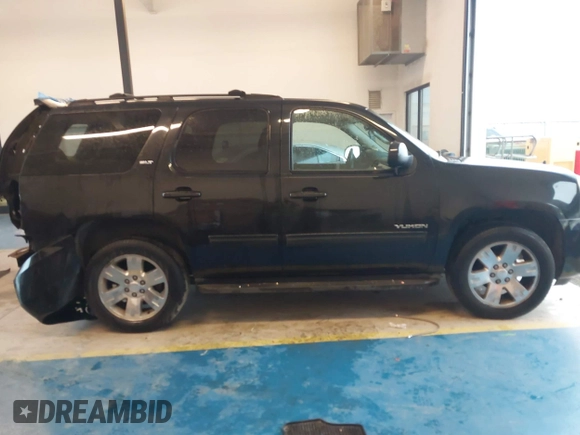 2011 GMC Yukon SLT z VIN 1GKS2CE00BR260589, wystawiony jako IAAI lot #41858005 z przebiegiem 191 594 mil mil oraz . Historia ofert i sprzedaży dostępna na DreamBid. Obrazek 13.