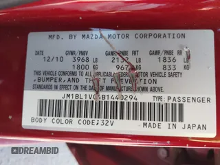 2011 Mazda 3 i Touring with VIN JM1BL1VG4B1440294, listed as a IAAI auction lot 42206976 with 183,693 mi miles. Bid and sale history available at carsss.com. Image 9.