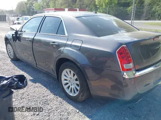 2014 Chrysler 300 z VIN 2C3CCAAG1EH212760, wystawiony jako IAAI lot #42139245 z przebiegiem 129 868 mil mil oraz . Historia ofert i sprzedaży dostępna na DreamBid. Obrazek 3.