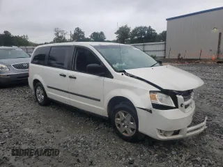 2010 Dodge Grand Caravan Cargo with VIN 2D4CN1AEXAR377301, listed as a Copart auction lot 71476774 with 125,421 mi miles and Salvage Title. Bid and sale history available at carsss.com. Image 4.