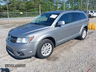 2017 Dodge Journey SXT z VIN 3C4PDCBG4HT563310, wystawiony jako IAAI lot #42190636 z przebiegiem 171 054 mil mil oraz . Historia ofert i sprzedaży dostępna na DreamBid. Obrazek 17.