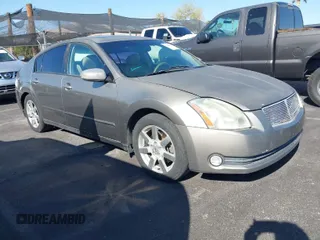 2004 Nissan Maxima SE with VIN 1N4BA41E24C819772, listed as a IAAI auction lot 41982374 with 171,299 mi miles. Bid and sale history available at carsss.com. Image 1.