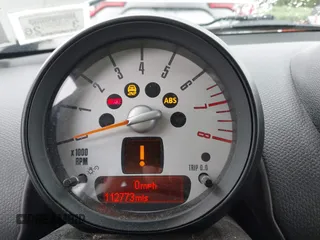 2014 MINI Countryman S z VIN WMWZC5C54EWM17898, wystawiony jako IAAI lot #42343469 z przebiegiem 112 773 mil mil oraz . Historia ofert i sprzedaży dostępna na DreamBid. Obrazek 7.