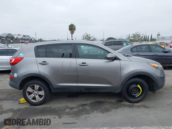2013 Kia Sportage LX with VIN KNDPBCA23D7529658, listed as a IAAI auction lot 42473877 with 114,797 mi miles and . Bid and sale history available at DreamBid. Image 13.