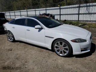 2016 Jaguar XJ with VIN SAJWA2G70G8W01136, listed as a Copart auction lot 50120455 with 92,224 mi miles and Salvage Title. Bid and sale history available at carsss.com. Image 4.
