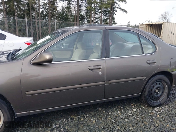 1999 Nissan Altima XE with VIN 1N4DL01D1XC210017, listed as a IAAI auction lot 41199544 with 297,917 mi miles. Bid and sale history available at carsss.com. Image 14.