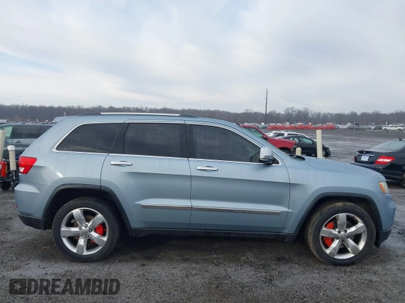 2013 Jeep Grand Cherokee Overland with VIN 1C4RJFCT2DC572978, listed as a IAAI auction lot 41468915 with 223,528 mi miles. Bid and sale history available at carsss.com. Image 13.