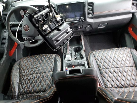 2024 Nissan Frontier Pro-4X with VIN 1N6ED1EK5RN627574, listed as a Copart auction lot 43977725 with 12,019 mi miles and Salvage title. Bid and sale history available at DreamBid. Image 8.