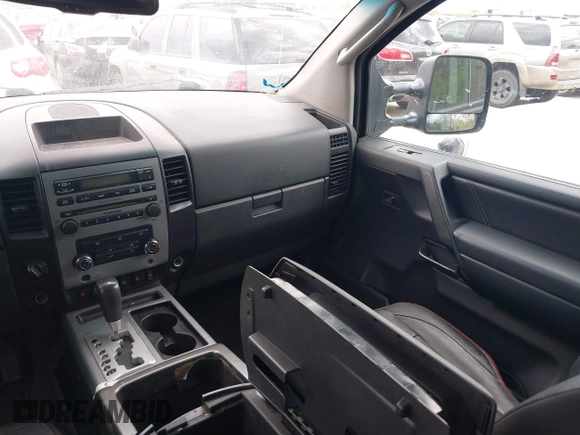 2011 Nissan Titan Pro-4X with VIN 1N6BA0EC3BN320795, listed as a IAAI auction lot 41868113 with 183,919 mi miles and . Bid and sale history available at DreamBid. Image 18.