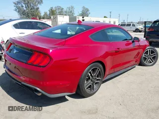 2021 Ford Mustang EcoBoost with VIN 1FA6P8TH7M5125744, listed as a IAAI auction lot 42520877 with 31,953 mi miles and . Bid and sale history available at DreamBid. Image 4.