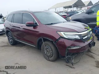 2019 Honda Pilot Touring 7-Passenger with VIN 5FNYF5H60KB026898, listed as a IAAI auction lot 42816040 with 68,108 mi miles and . Bid and sale history available at DreamBid. Image 1.