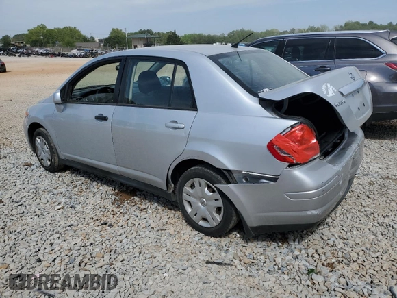 2011 Nissan Versa S with VIN 3N1BC1AP3BL452650, listed as a Copart auction lot 52206885 with 168,427 mi miles and Salvage title. Bid and sale history available at DreamBid. Image 2.
