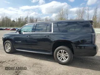 2015 Chevrolet Suburban LT with VIN 1GNSKJKC9FR510682, listed as a Copart auction lot 55427315 with 202,592 mi miles and Salvage Title. Bid and sale history available at DreamBid. Image 2.