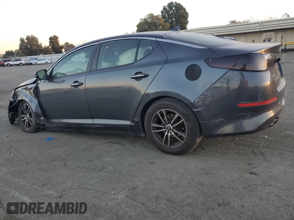 2015 Kia Optima LX with VIN 5XXGM4A72FG469281, listed as a Copart auction lot 83656144 with 129,491 mi miles and Salvage Title. Bid and sale history available at DreamBid. Image 2.