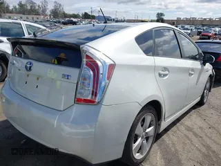 2012 Toyota Prius One with VIN JTDKN3DU1C1549990, listed as a IAAI auction lot 41543634 with 118,496 mi miles and . Bid and sale history available at carsss.com. Image 4.
