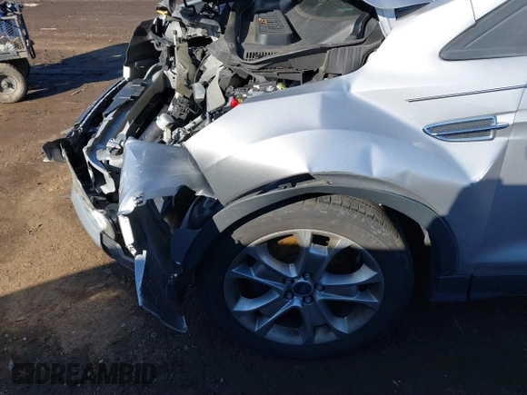 2015 Ford Escape Titanium with VIN 1FMCU0J93FUC02844, listed as a IAAI auction lot 41531293 with 115,392 mi miles and . Bid and sale history available at DreamBid. Image 19.
