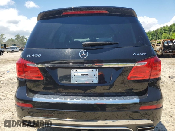 2015 Mercedes-Benz GL with VIN 4JGDF6EE1FA562088, listed as a Copart auction lot 58736934 with 104,550 mi miles and Salvage Title. Bid and sale history available at carsss.com. Image 6.