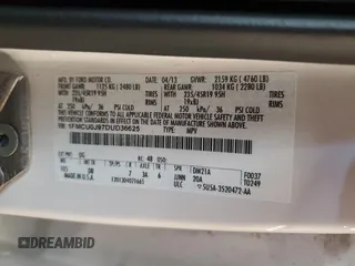 2013 Ford Escape Titanium z VIN 1FMCU0J97DUD36625, wystawiony jako Copart lot #55961815 z przebiegiem 163 327 mil mil oraz Szkoda całkowita • Salvage title. Historia ofert i sprzedaży dostępna na DreamBid. Obrazek 13.