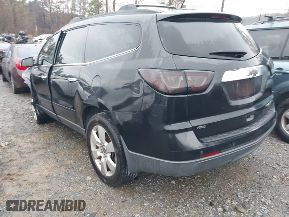 2013 Chevrolet Traverse LT with VIN 1GNKVJKD9DJ124307, listed as a IAAI auction lot 41864010 with 123,458 mi miles and . Bid and sale history available at DreamBid. Image 3.