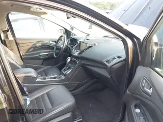 2015 Ford Escape Titanium с VIN 1FMCU0JX9FUB03122, выставлен на аукционе IAAI как лот 42401753 с пробегом 168 526 миль миль и . История ставок и продаж доступна на DreamBid. Изображение 5.