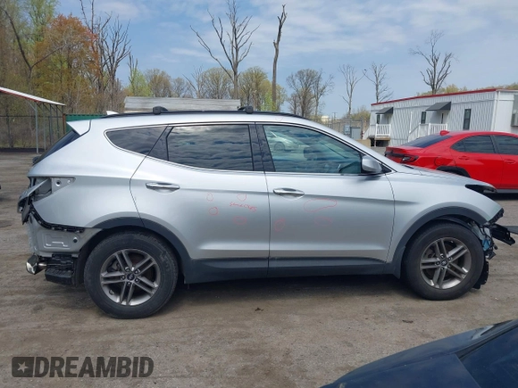 2017 Hyundai Santa Fe 2.4L z VIN 5XYZUDLB6HG400828, wystawiony jako IAAI lot #42013903 z przebiegiem 88 573 mil mil oraz . Historia ofert i sprzedaży dostępna na DreamBid. Obrazek 14.