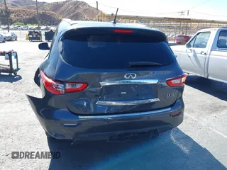 2013 Infiniti JX35 with VIN 5N1AL0MM8DC317601, listed as a IAAI auction lot 40678694 with 142,221 mi miles and . Bid and sale history available at DreamBid. Image 16.