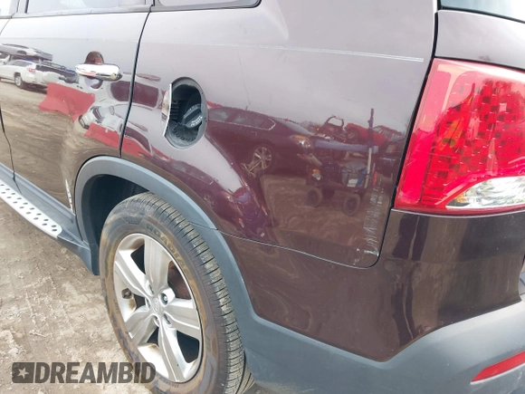 2012 Kia Sorento EX with VIN 5XYKU4A20CG200895, listed as a IAAI auction lot 41631262 with 176,997 mi miles. Bid and sale history available at carsss.com. Image 6.