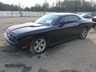 2013 Dodge Challenger SXT z VIN 2C3CDYAG0DH511323, wystawiony jako IAAI lot #41369796 z przebiegiem Nie podano mil oraz . Historia ofert i sprzedaży dostępna na DreamBid. Obrazek 19.