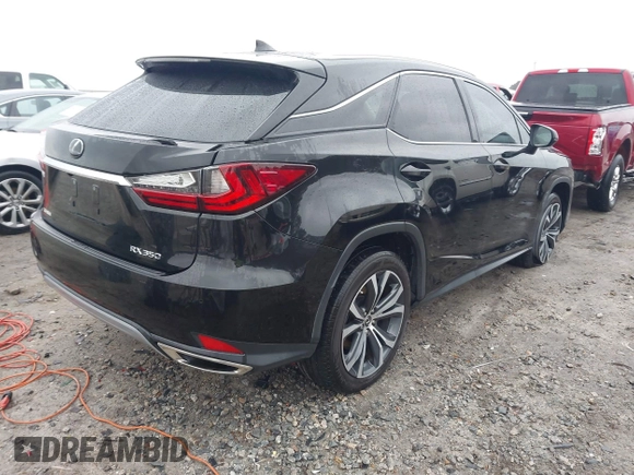 2021 Lexus RX with VIN 2T2HZMAA0MC201749, listed as a IAAI auction lot 41426758 with 148,064 mi miles. Bid and sale history available at carsss.com. Image 4.