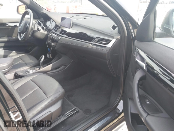 2021 BMW X1 xDrive28i with VIN WBXJG9C05M5T83784, listed as a IAAI auction lot 41696073 with 15,865 mi miles and . Bid and sale history available at DreamBid. Image 5.