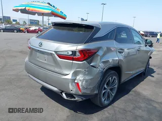 2017 Lexus RX 350 z VIN 2T2ZZMCA3HC041664, wystawiony jako IAAI lot #42379331 z przebiegiem 153 887 mil mil oraz . Historia ofert i sprzedaży dostępna na DreamBid. Obrazek 4.