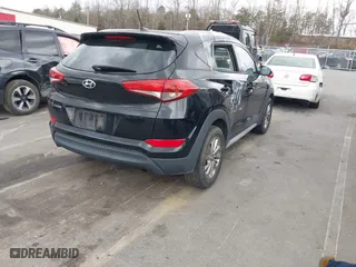 2017 Hyundai Tucson SE Plus with VIN KM8J33A49HU584557, listed as a IAAI auction lot 41853951 with 105,602 mi miles. Bid and sale history available at carsss.com. Image 4.