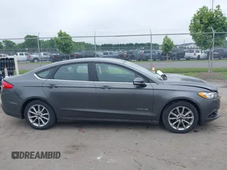 2017 Ford Fusion Hybrid SE with VIN 3FA6P0LU2HR301083, listed as a IAAI auction lot 42602798 with 89,003 mi miles and . Bid and sale history available at DreamBid. Image 13.
