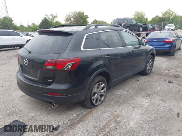 2014 Mazda CX-9 Sport with VIN JM3TB3BV8E0437180, listed as a IAAI auction lot 42413844 with 177,393 mi miles and . Bid and sale history available at DreamBid. Image 4.