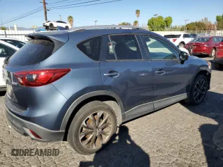 2016 Mazda CX-5 Grand Touring with VIN JM3KE2DY8G0644790, listed as a Copart auction lot 82060424 with 0 mi miles and Clean Title. Bid and sale history available at carsss.com. Image 3.