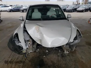 2024 Tesla Model Y z VIN 7SAYGDED2RF077262, wystawiony jako Copart lot #47797735 z przebiegiem 9 574 mil mil oraz Szkoda całkowita • Salvage title. Historia ofert i sprzedaży dostępna na DreamBid. Obrazek 5.