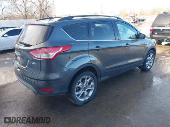2015 Ford Escape SE with VIN 1FMCU9G98FUA70885, listed as a IAAI auction lot 41608240 with 54,802 mi miles. Bid and sale history available at carsss.com. Image 4.